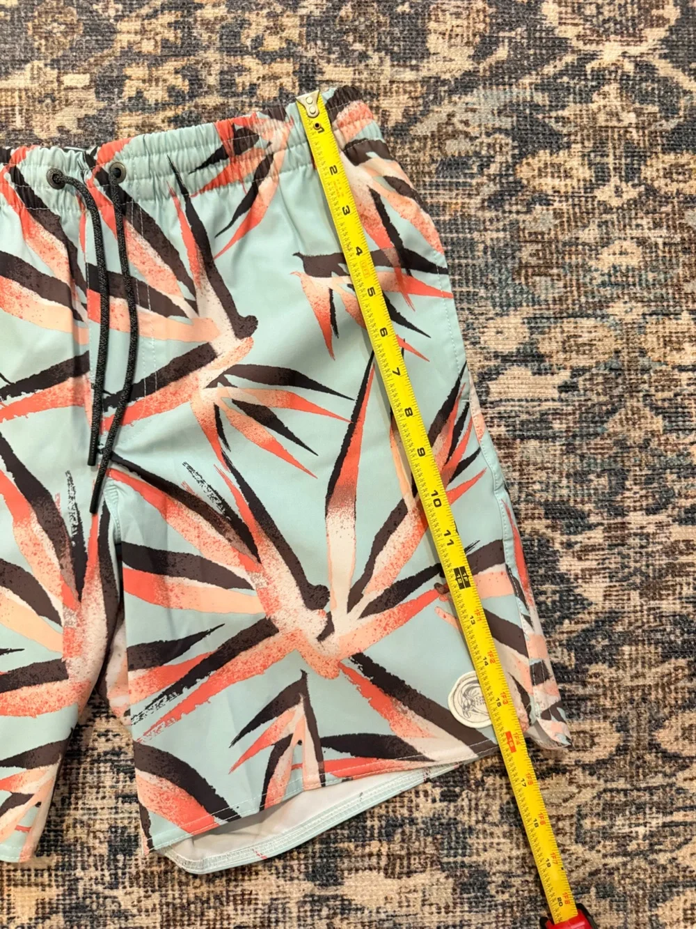 O'Neill Mint Blue Tropical Print Swim Shorts with Coral and Black Accents